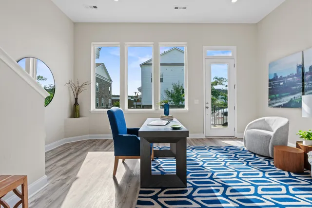 a bathroom with a toilet a sink and a mirror