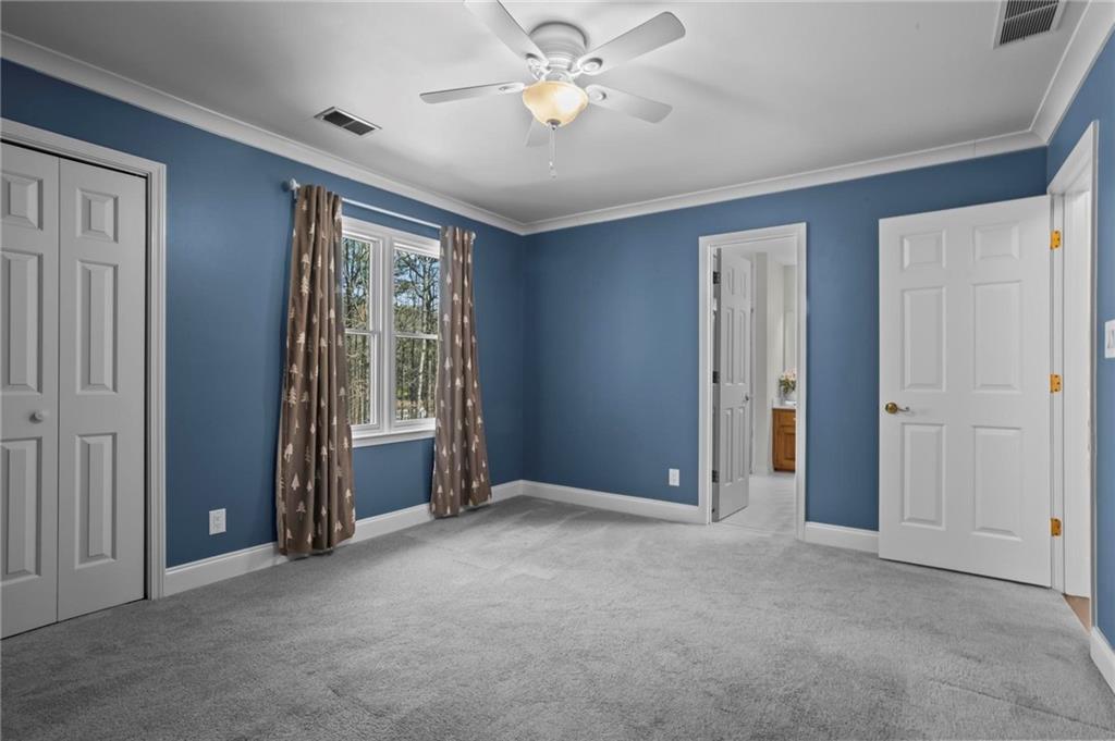 4350 Fallowfield Lane Southwest Lilburn, GA 30047 - Photo 28 of 64 a view of an empty room with a window