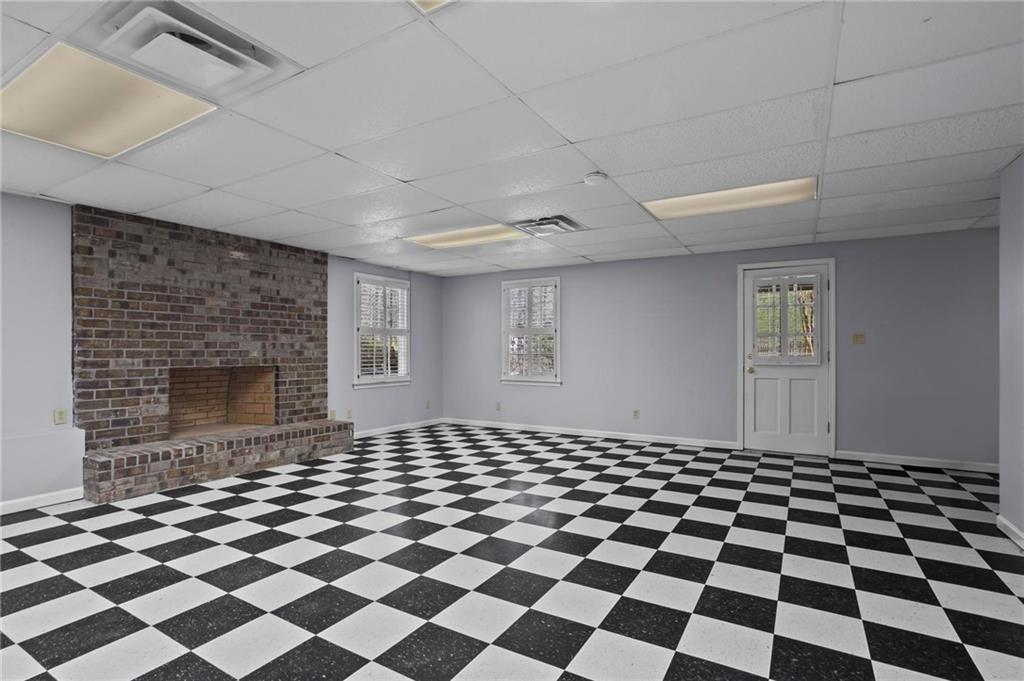 4350 Fallowfield Lane Southwest Lilburn, GA 30047 - Photo 39 of 64 a black and white checkered floor