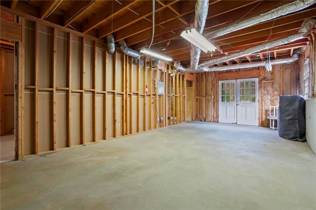 4350 Fallowfield Lane Southwest Lilburn, GA 30047 - Photo 43 of 64 a view of an empty room