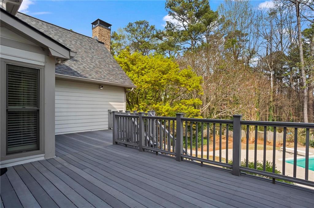 4350 Fallowfield Lane Southwest Lilburn, GA 30047 - Photo 45 of 64 a view of a wooden balcony