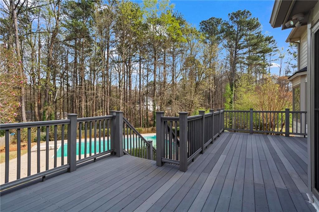 4350 Fallowfield Lane Southwest Lilburn, GA 30047 - Photo 46 of 64 a view of deck with wooden floor and fence