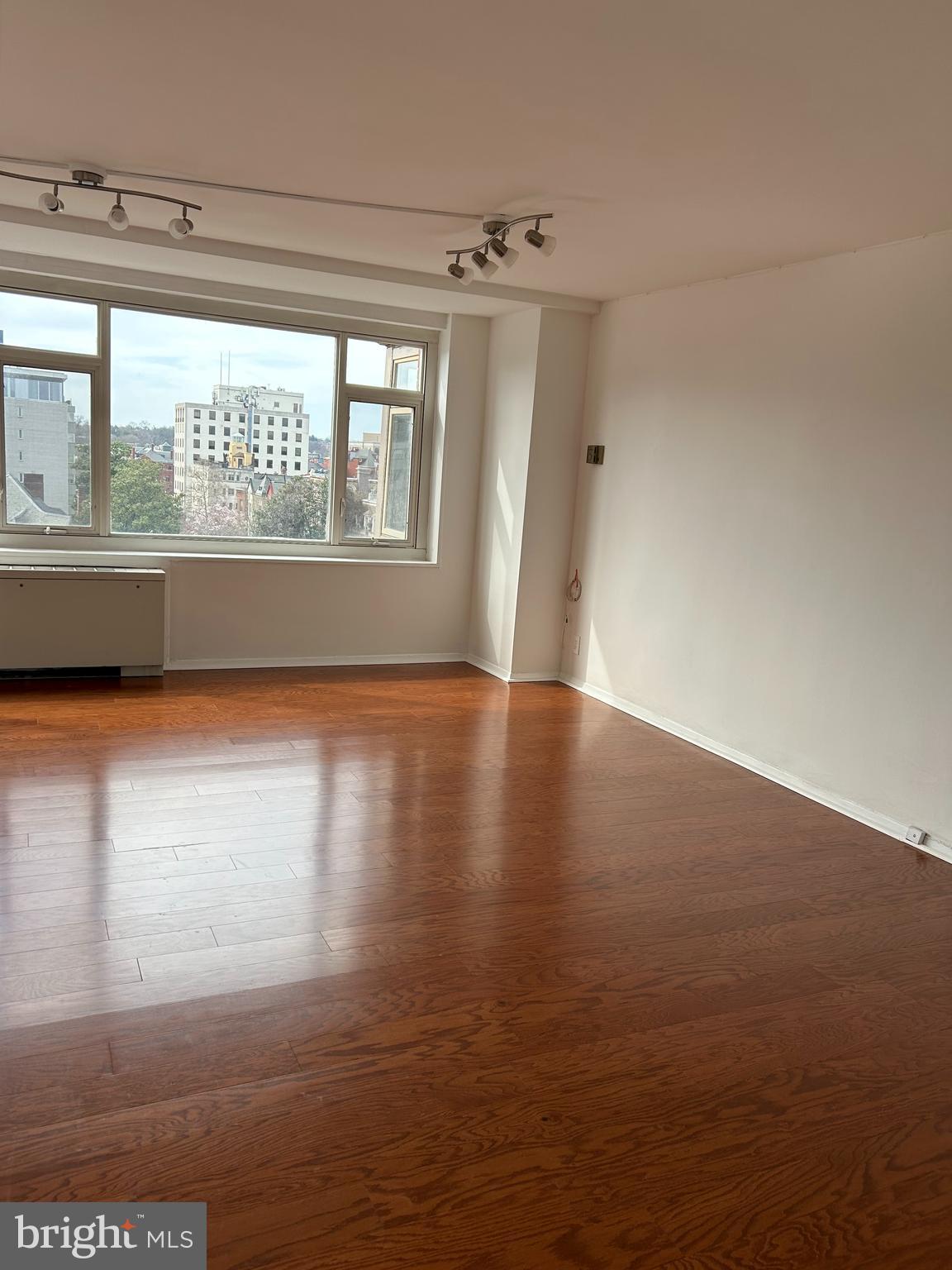 1545 18th Street Northwest, Unit 822 Washington, DC 20036 - Photo 11 of 18 New wood floors and expansive windows