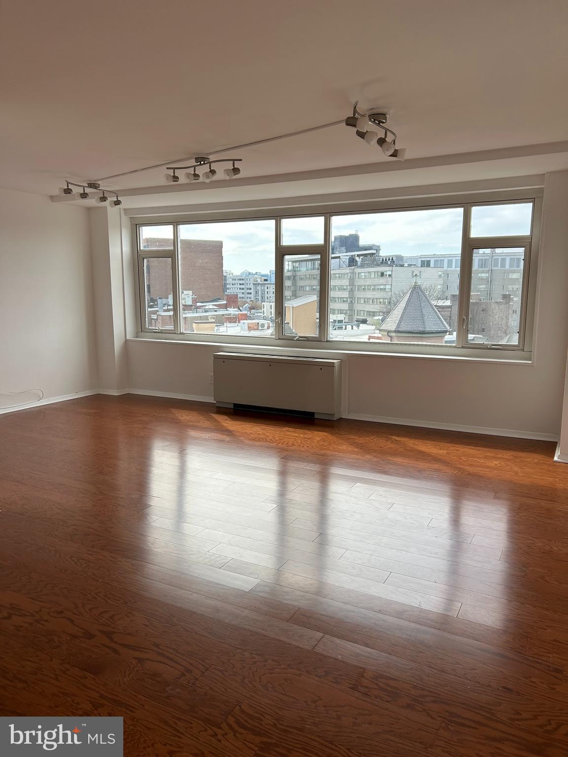 1545 18th Street Northwest, Unit 822 Washington, DC 20036 - Photo 10 of 18 Living room with a wall of windows