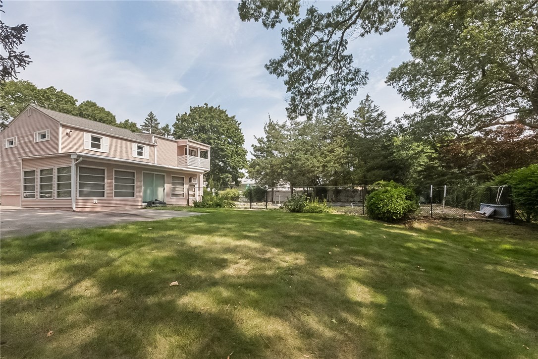 84 Rustic Way Warwick, RI 02886 - Photo 11 of 18 Rear view from back yard