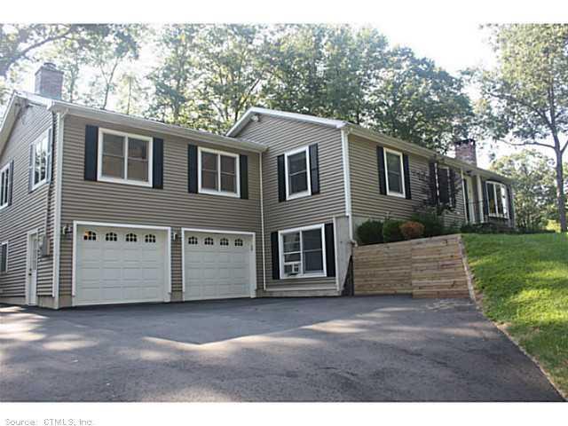 91 Hayden Hill Road Haddam, CT 06438 - Photo 1 of 1 a front view of a house with a garden