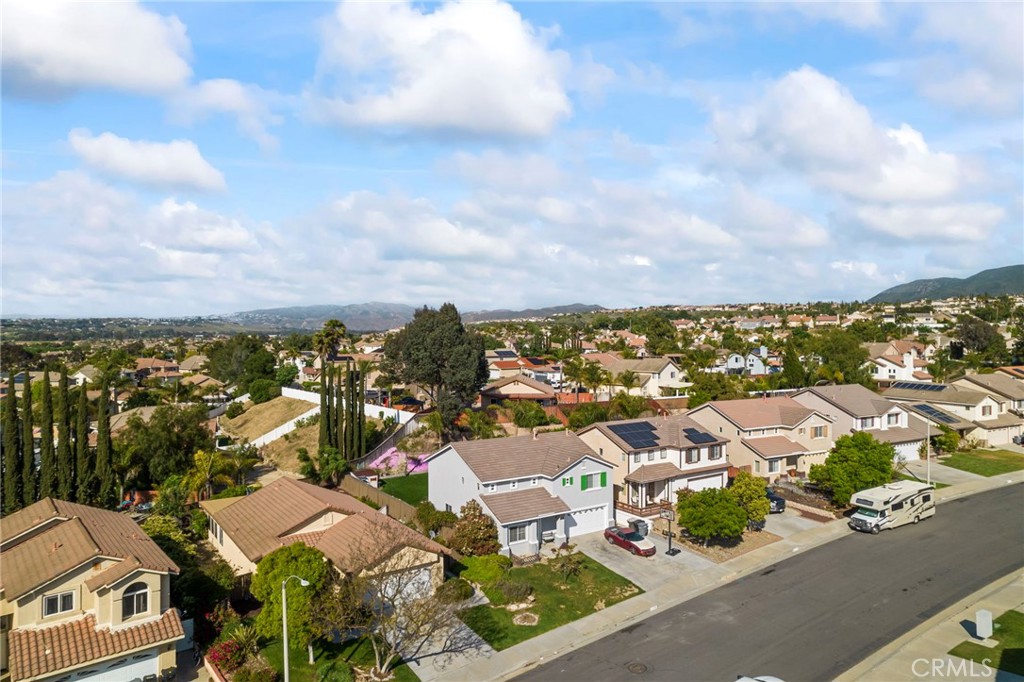 33298 Ave Bicicleta Temecula, CA 92592 - Photo 38 of 42 an aerial view of residential houses with open space