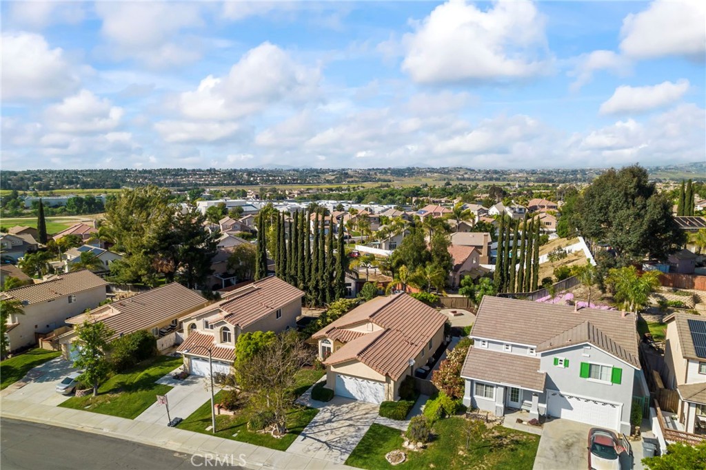 33298 Ave Bicicleta Temecula, CA 92592 - Photo 39 of 42 an aerial view of a city with lots of residential buildings ocean and mountain view in back