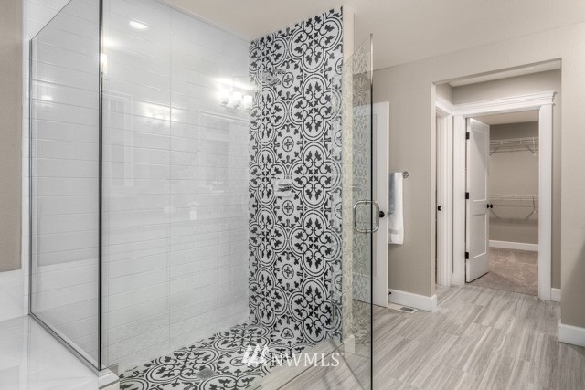 23226 7th Drive Southeast Bothell, WA 98021 - Photo 15 of 24 a bathroom with a shower and a glass door