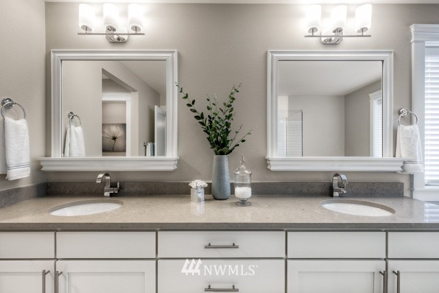 23226 7th Drive Southeast Bothell, WA 98021 - Photo 16 of 24 a bathroom with sink and mirror