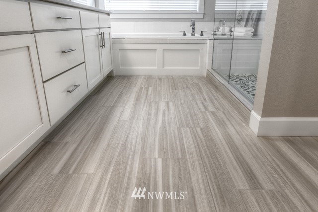 23226 7th Drive Southeast Bothell, WA 98021 - Photo 17 of 24 a utility room with cabinets washer and dryer