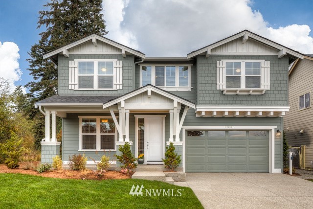 23226 7th Drive Southeast Bothell, WA 98021 - Photo 22 of 24 a front view of a house with a yard