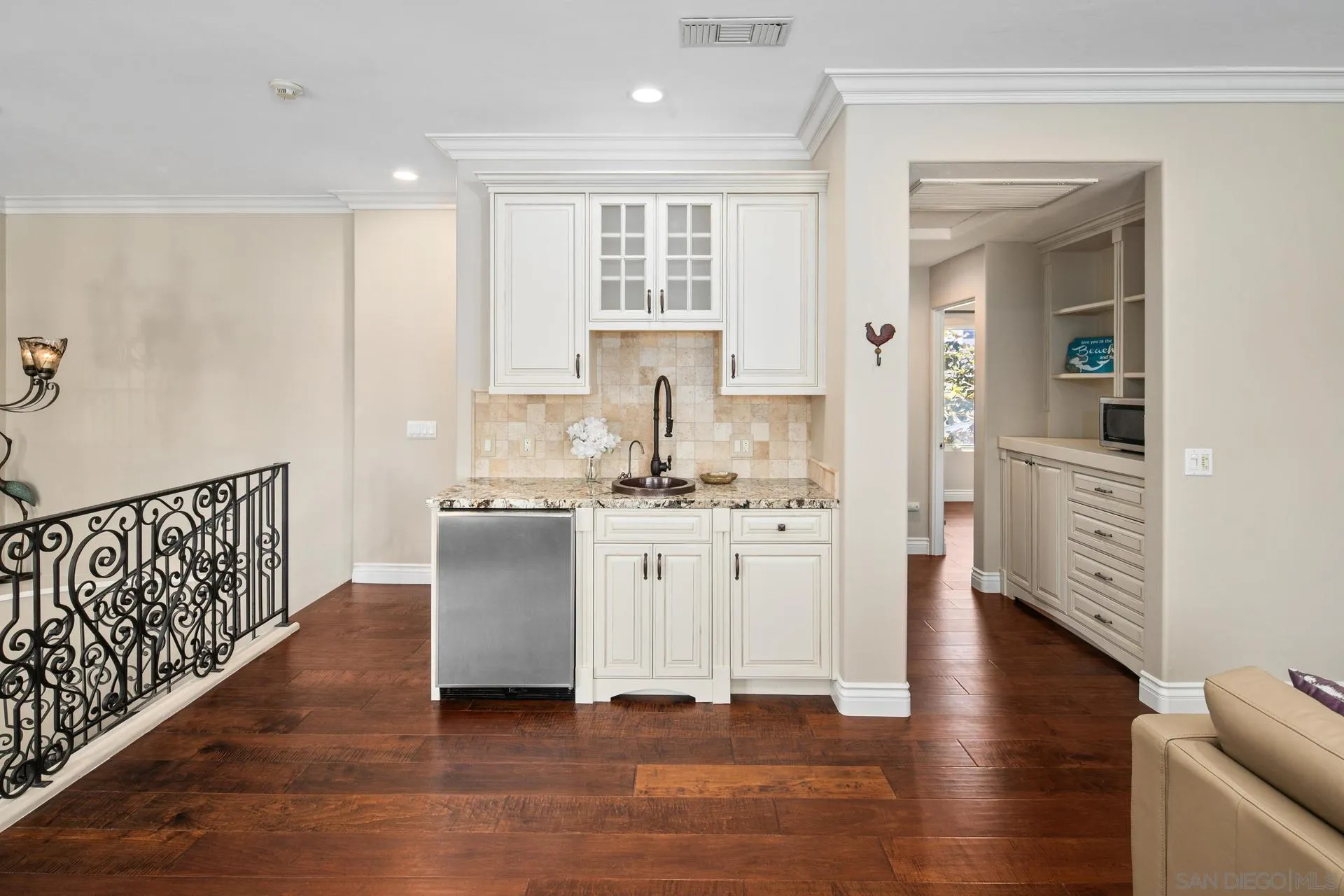 1100 Pine Street Coronado, CA 92118 - Photo 25 of 57 a kitchen with stainless steel appliances sink refrigerator and wooden floor