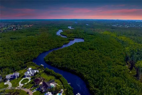 a view of a lake with houses