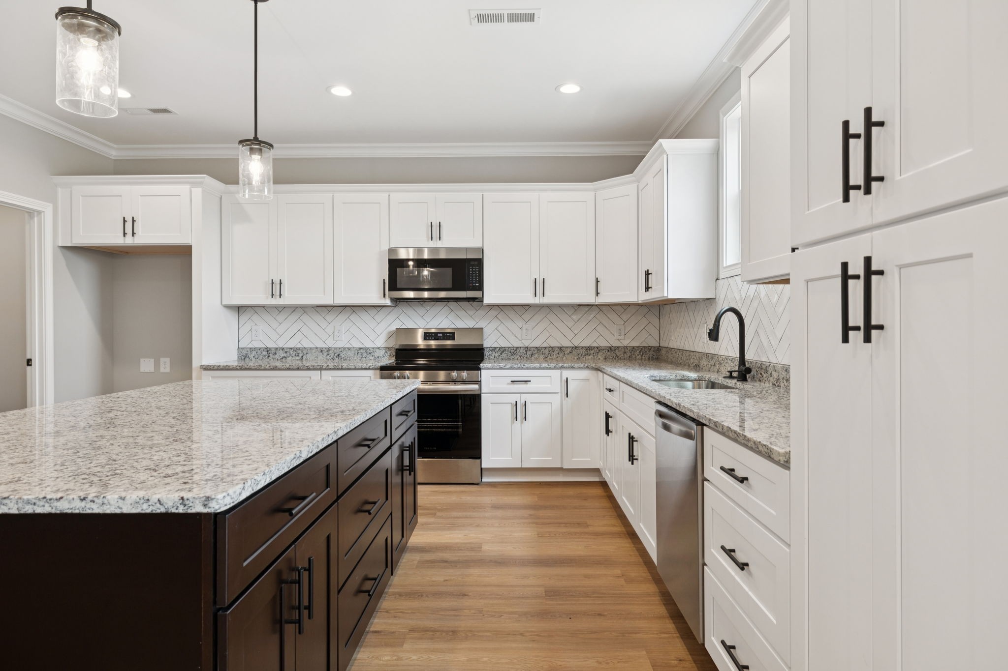 28 Faith Lane Lebanon, TN 37087 - Photo 12 of 53 a kitchen with stainless steel appliances granite countertop a sink stove and refrigerator