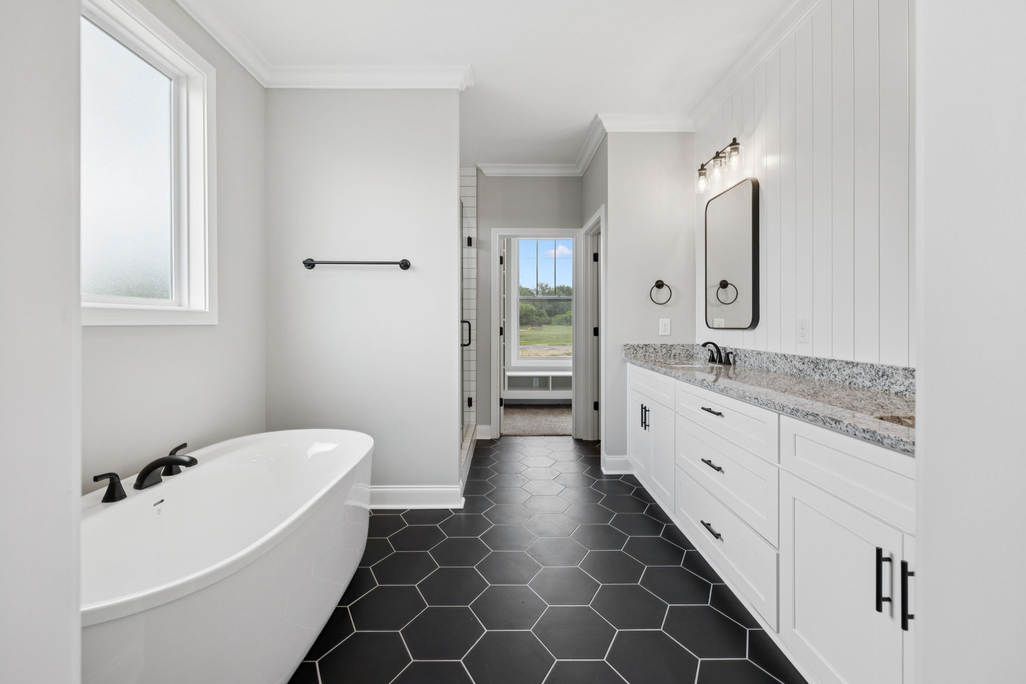 28 Faith Lane Lebanon, TN 37087 - Photo 18 of 53 a bathroom with a double vanity sink mirror and bathtub
