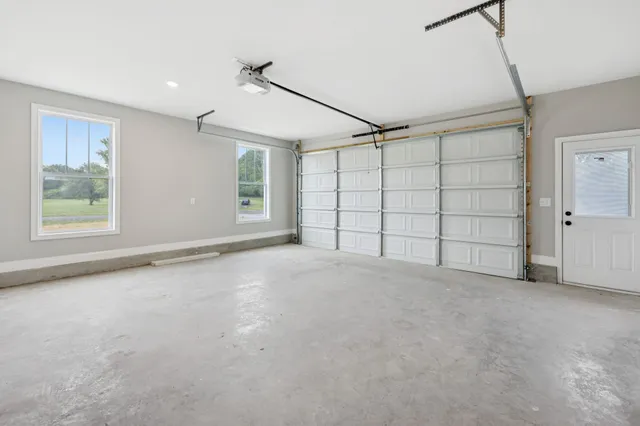 a view of a hallway with closet and entryway