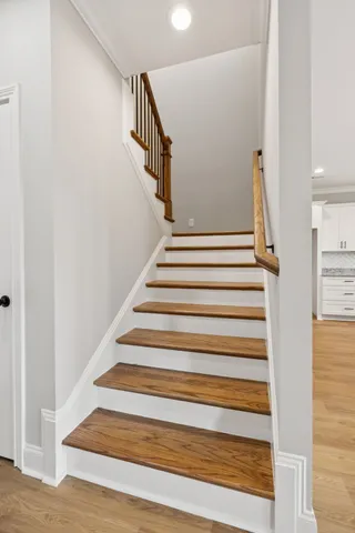 a view of a livingroom with a ceiling fan and window