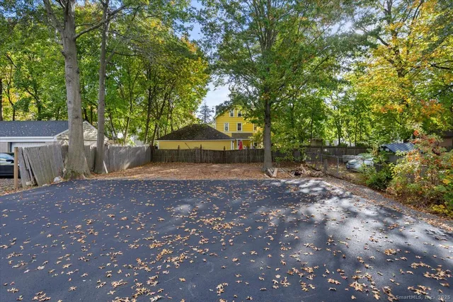 a view of backyard with green space