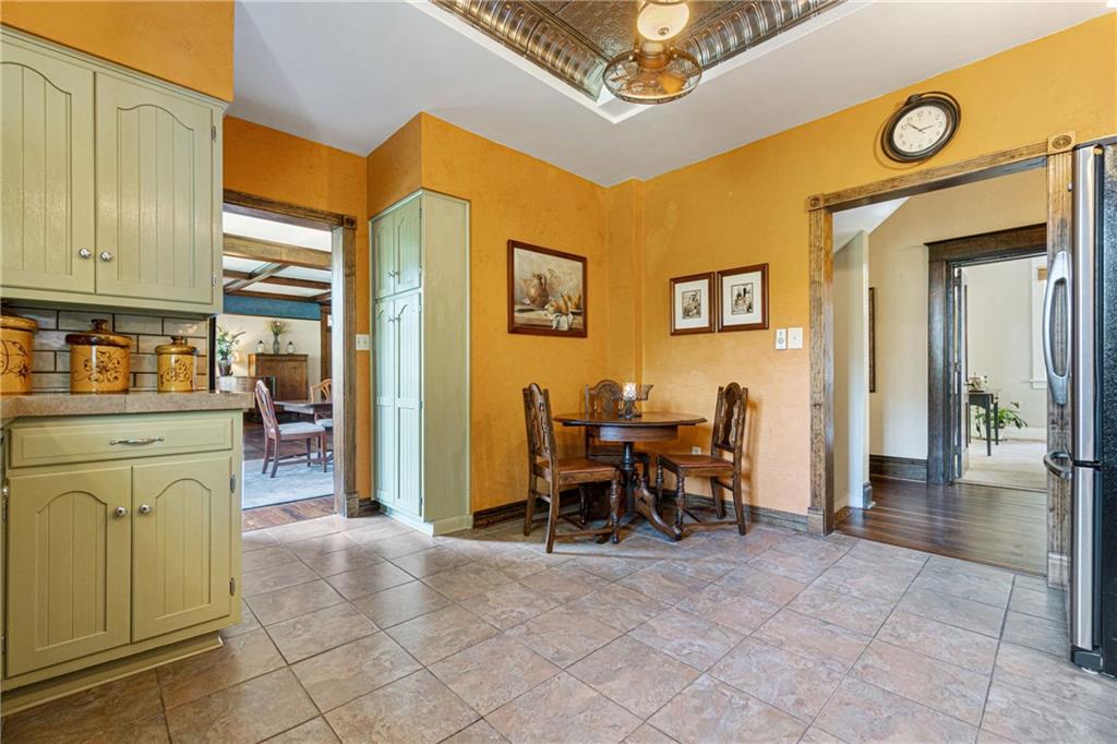 664 Hamilton Road Pittsburgh, PA 15205 - Photo 15 of 43 a view of a livingroom with furniture window and a kitchen