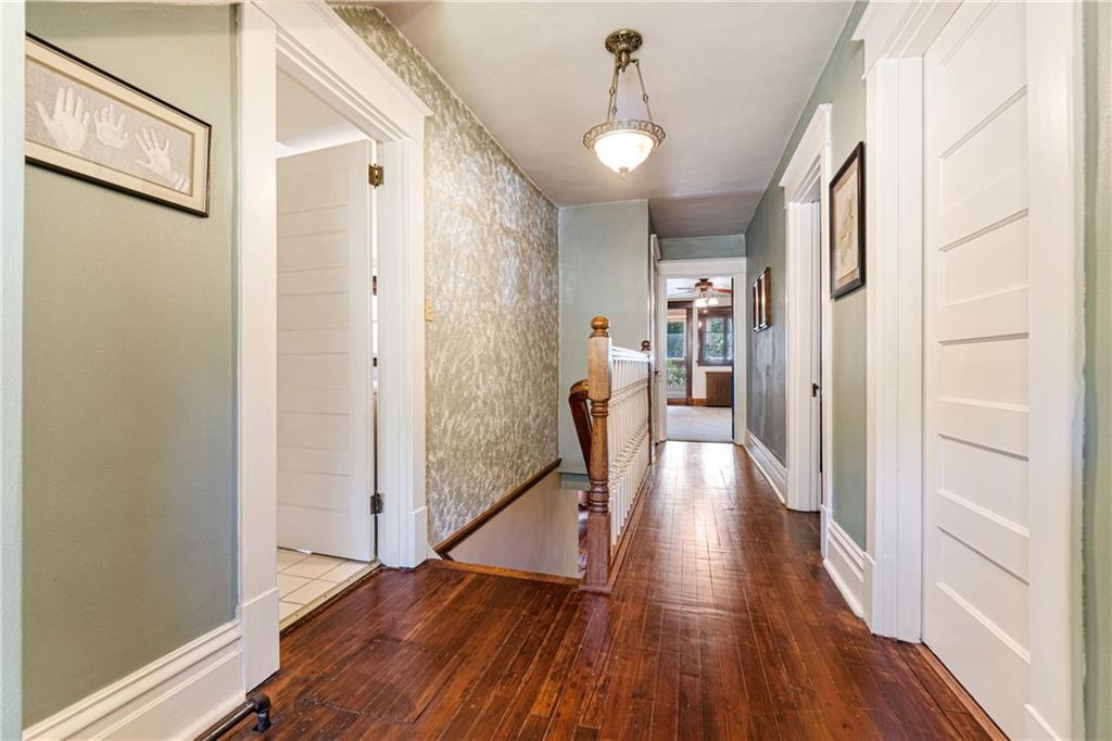 664 Hamilton Road Pittsburgh, PA 15205 - Photo 20 of 43 a view of a hallway view with wooden floor and staircase