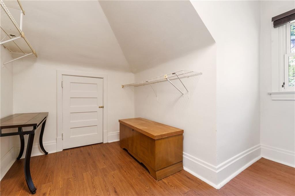 664 Hamilton Road Pittsburgh, PA 15205 - Photo 28 of 43 a bedroom with a bed and a window