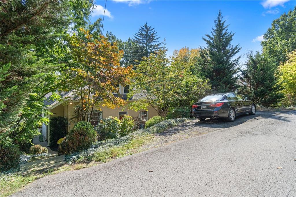 664 Hamilton Road Pittsburgh, PA 15205 - Photo 39 of 43 a car parked on the side of the road