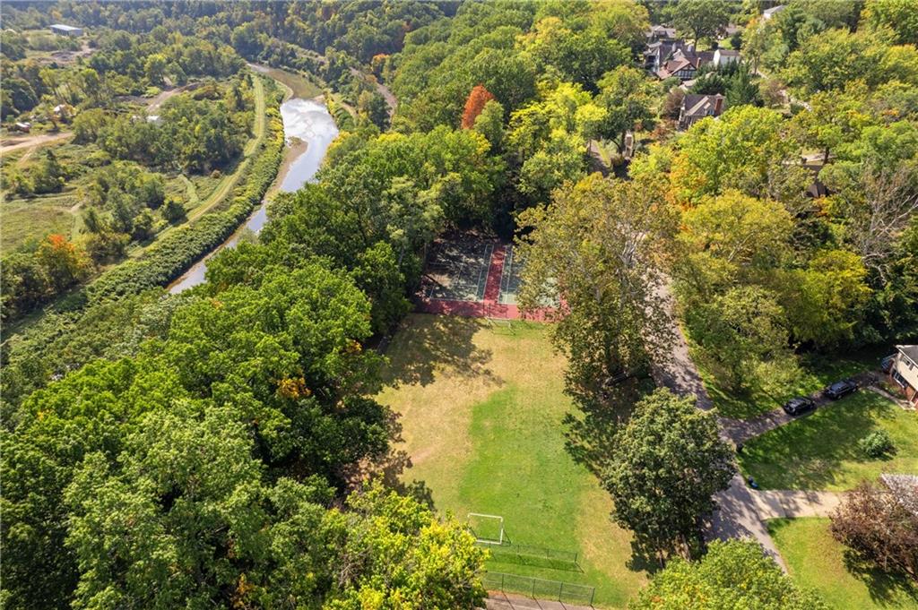 664 Hamilton Road Pittsburgh, PA 15205 - Photo 41 of 43 a view of a lake with a tree