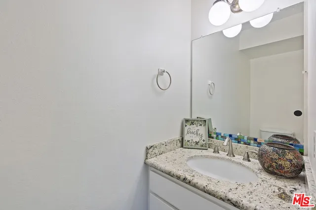 a view of hallway with wooden floor