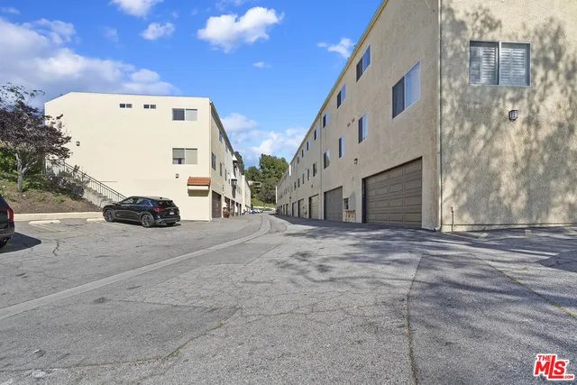 a view of a street with a house