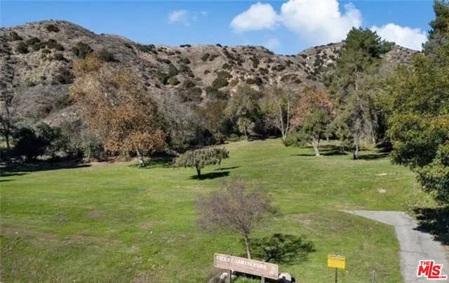 an aerial view of a house with outdoor space