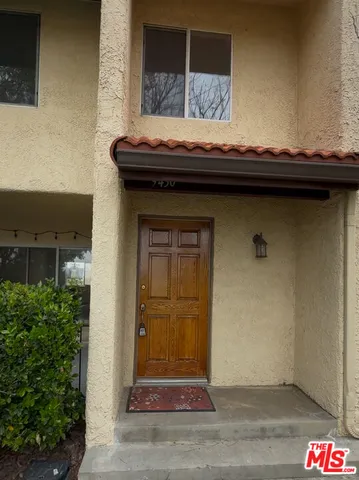 a view of a hallway with staircase