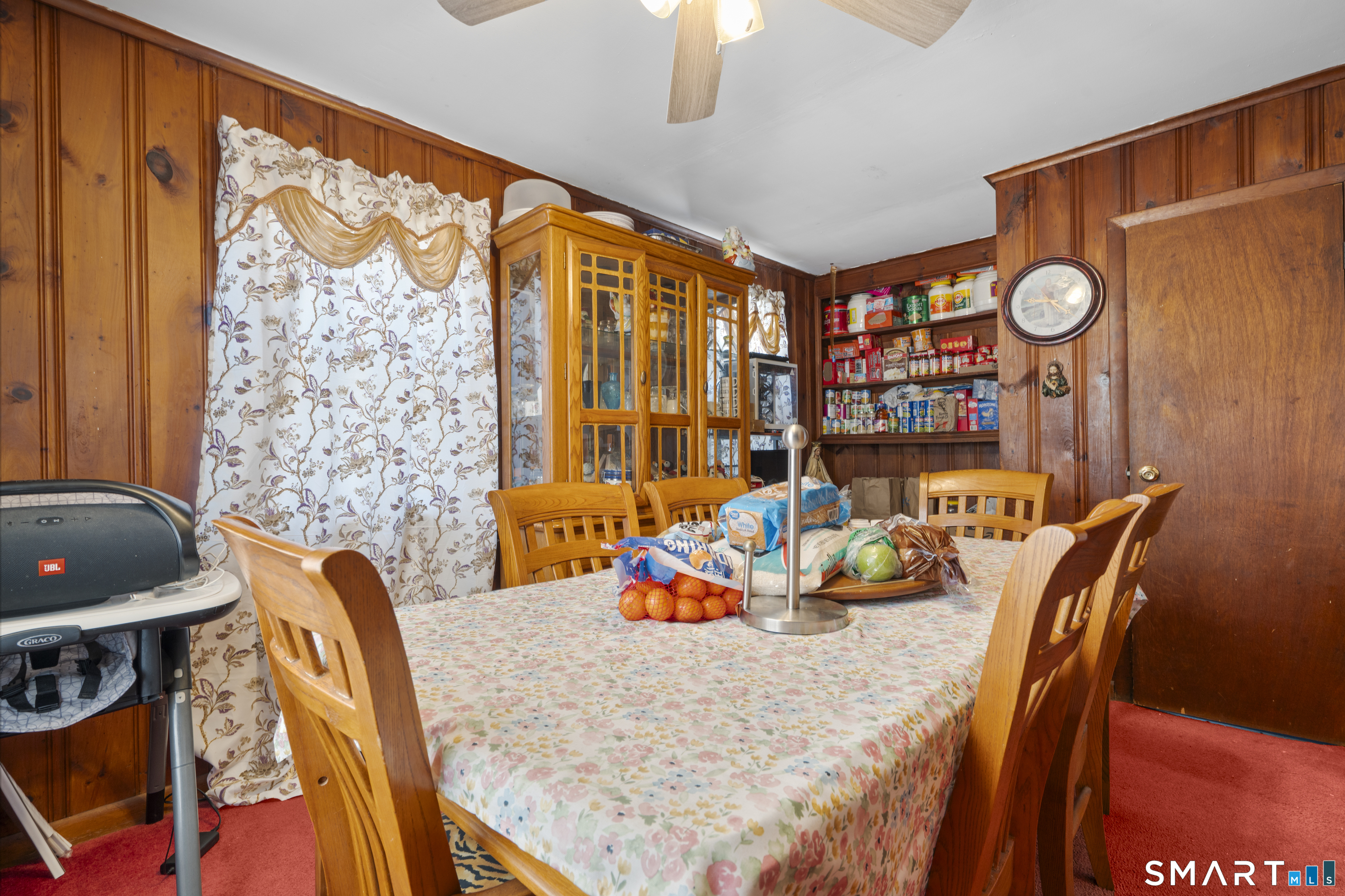 22 Tyler Circle Manchester, CT 06040 - Photo 12 of 27 a dining room with furniture and a large window