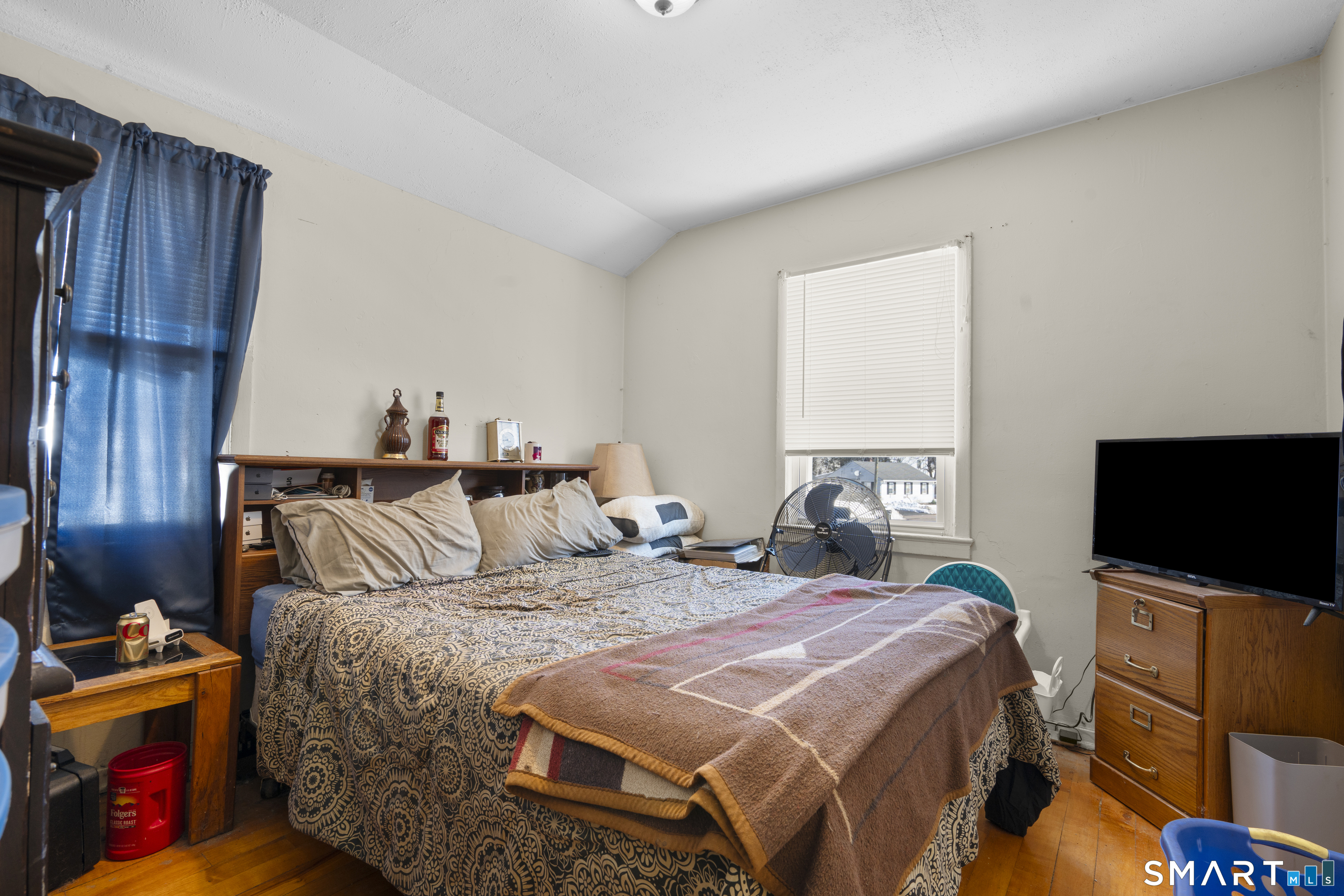 22 Tyler Circle Manchester, CT 06040 - Photo 10 of 27 a bedroom with a bed and a flat screen tv
