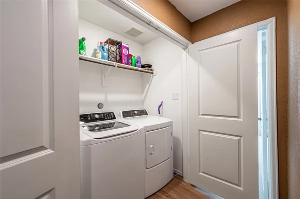 a utility room with dryer and washer