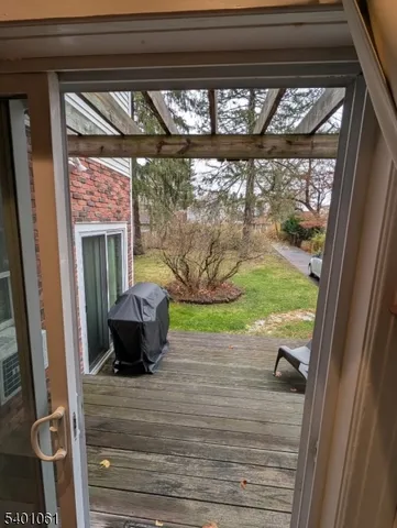 a view of a porch with furniture window and outside view