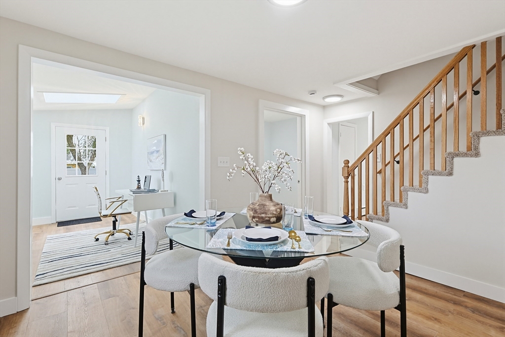 24 Otis Road Barnstable, MA 02601 - Photo 9 of 33 a view of a dining room with furniture and wooden floor