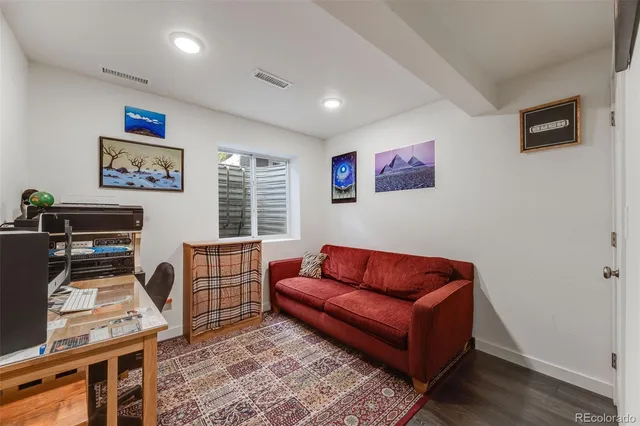 a view of a livingroom with storage & utility