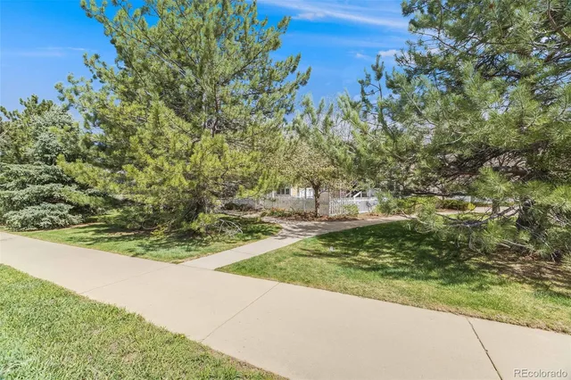 a view of garage and yard