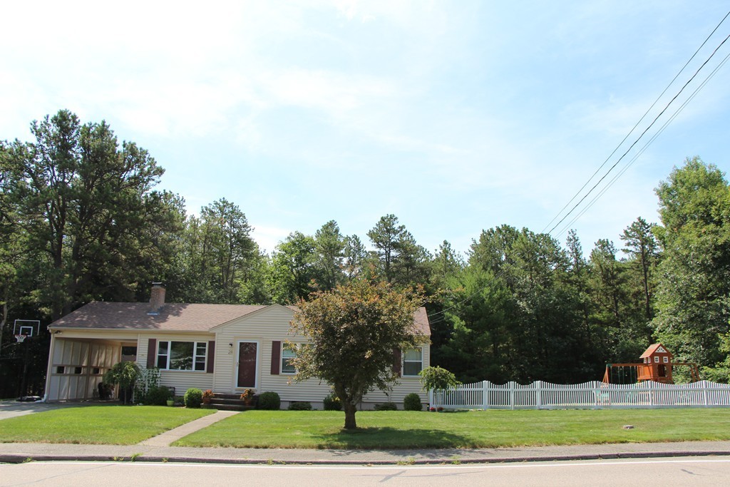 28 Deerfield Road Sharon, MA 02067 - Photo 20 of 20 a front view of a house with a yard