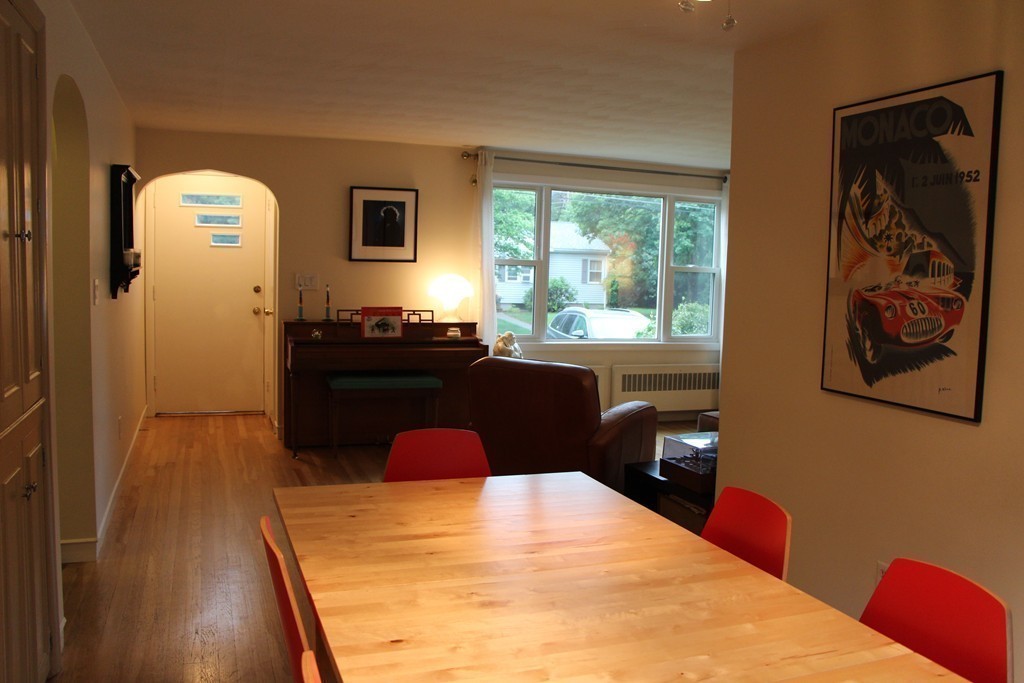 28 Deerfield Road Sharon, MA 02067 - Photo 3 of 20 a bedroom with a bed and wooden floor