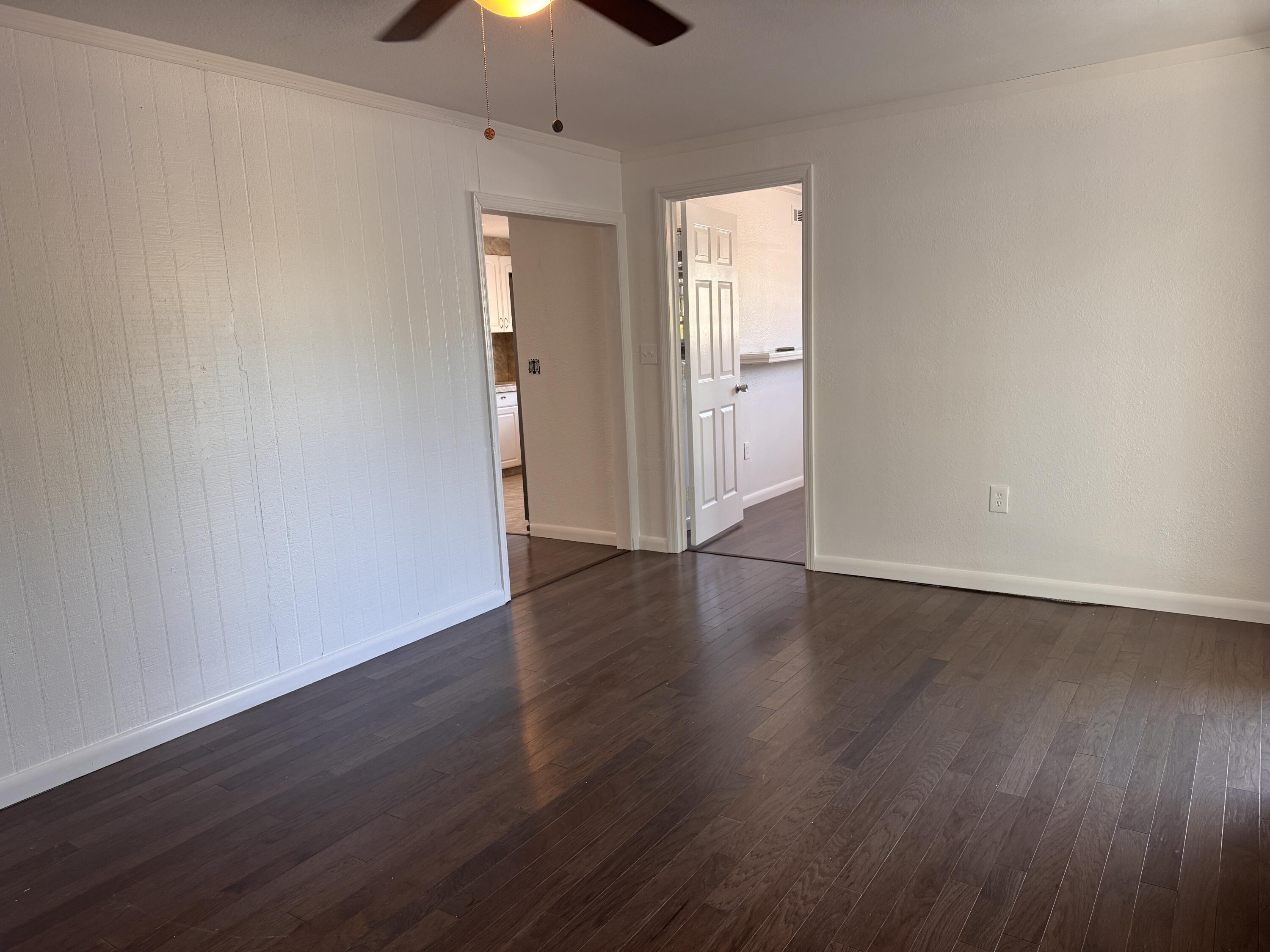 969 Plantation Road Key Largo, FL 33037 - Photo 6 of 26 wooden floor in an empty room