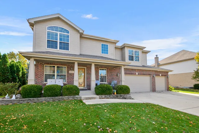 a view of livingroom with furniture and floor to ceiling window