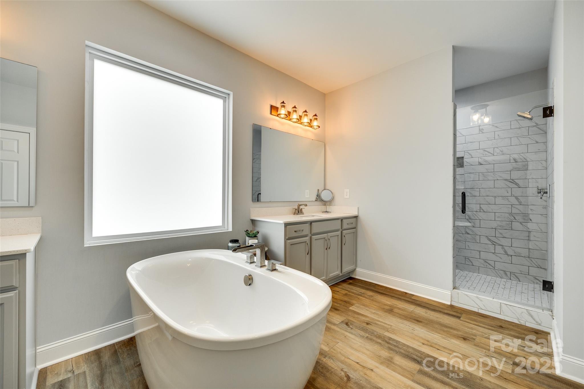 1336 West Rebound Road Lancaster, SC 29720 - Photo 20 of 45 a bathroom with a sink and a mirror