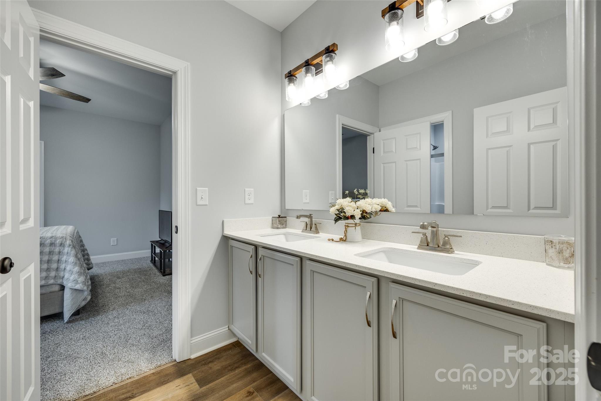 1336 West Rebound Road Lancaster, SC 29720 - Photo 29 of 45 a bathroom with a sink and a mirror