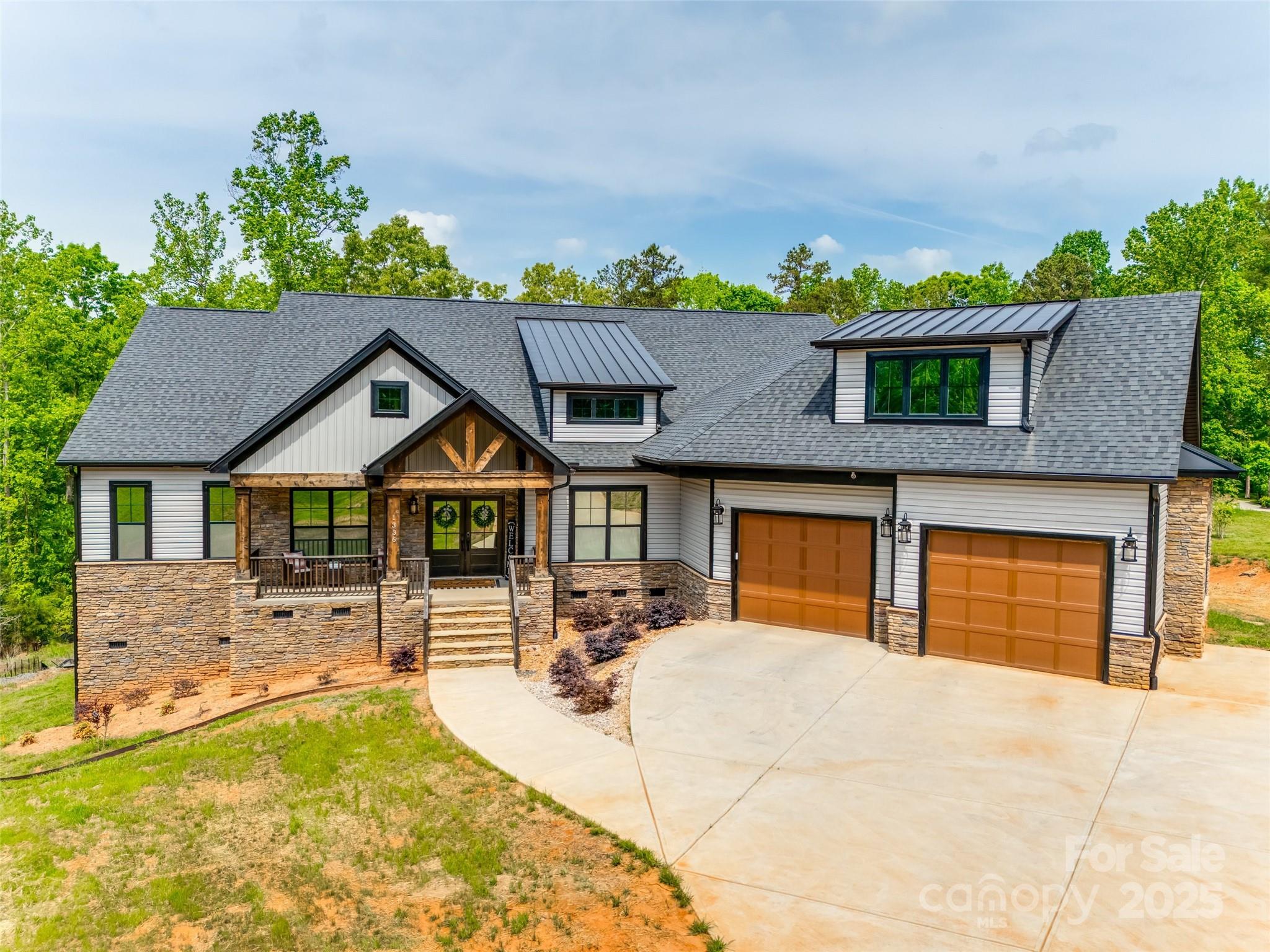 1336 West Rebound Road Lancaster, SC 29720 - Photo 41 of 45 a front view of a house with a yard and garage