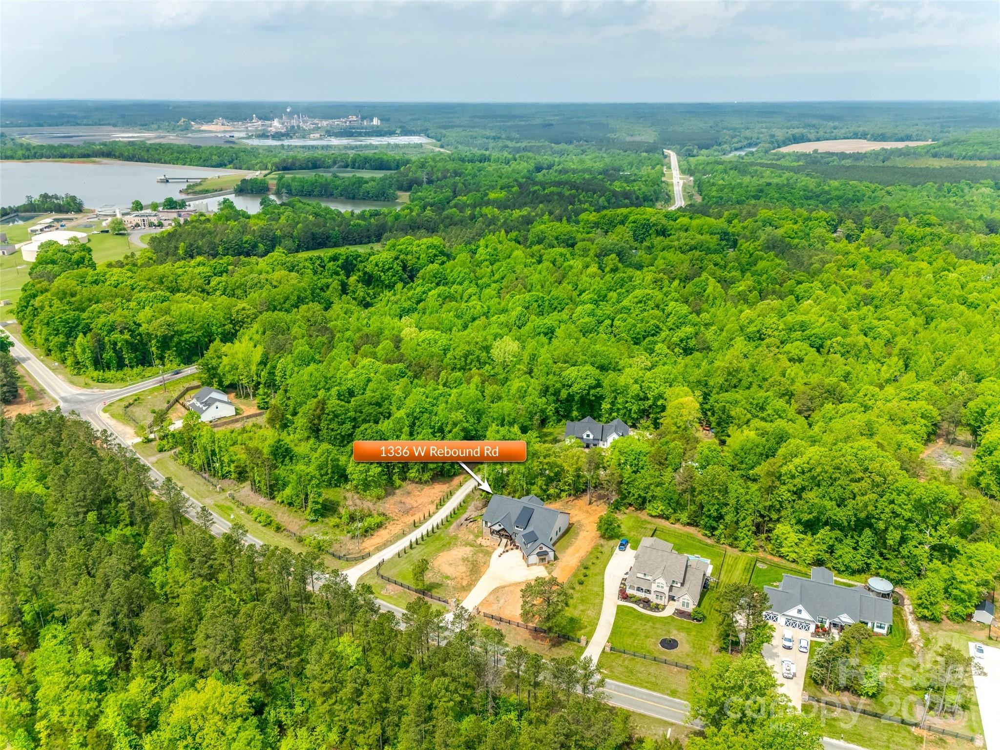 1336 West Rebound Road Lancaster, SC 29720 - Photo 45 of 45 an aerial view of residential houses with outdoor space and trees