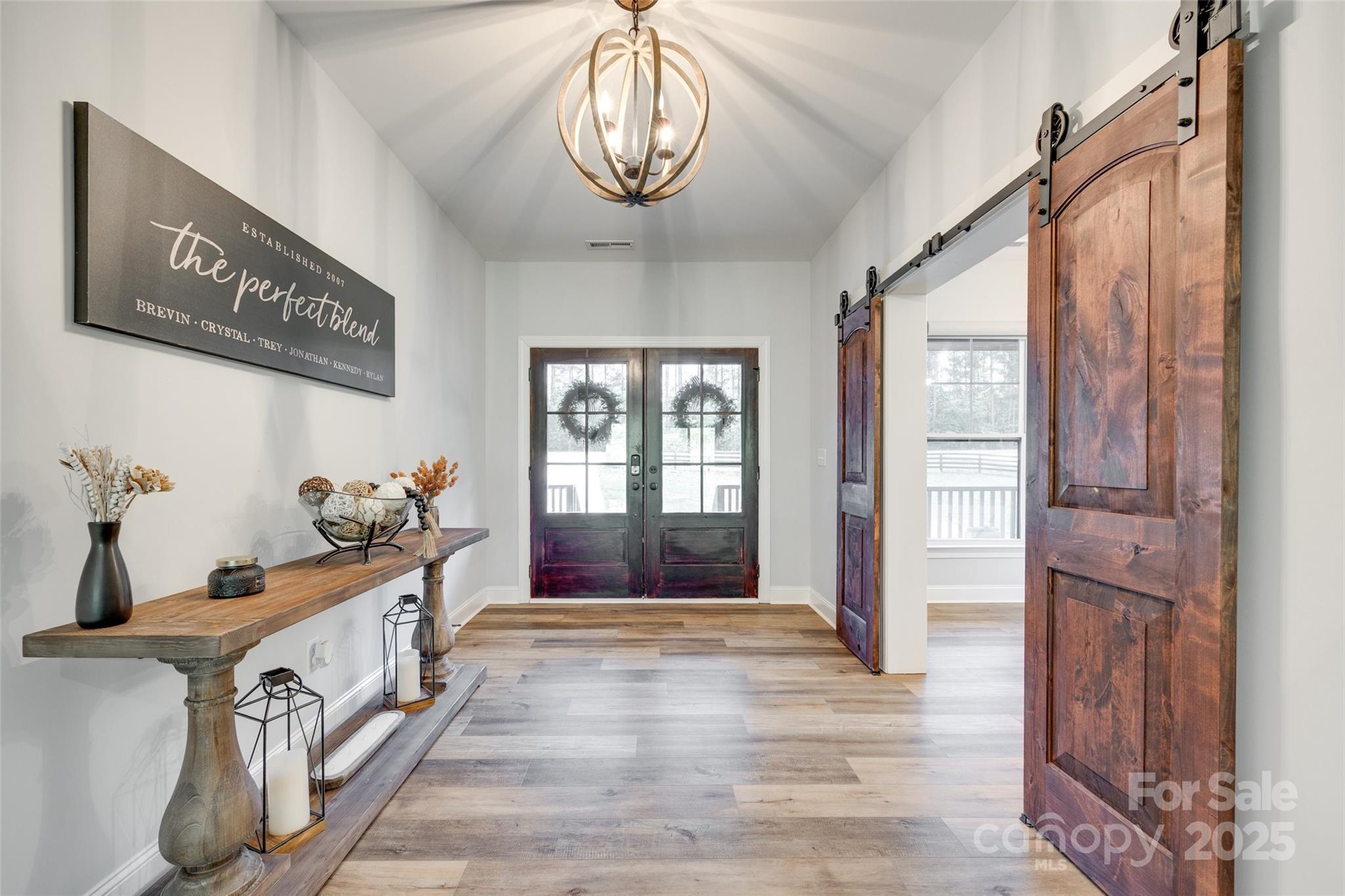 1336 West Rebound Road Lancaster, SC 29720 - Photo 5 of 45 a view of an entryway with wooden floor