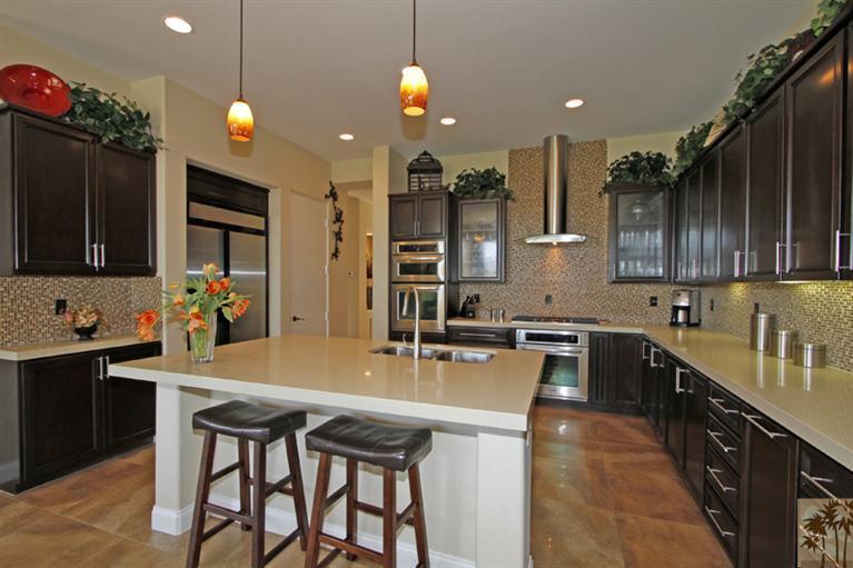 124 Loch Lomond Road Rancho Mirage, CA 92270 - Photo 11 of 25 a kitchen with a sink cabinets and window