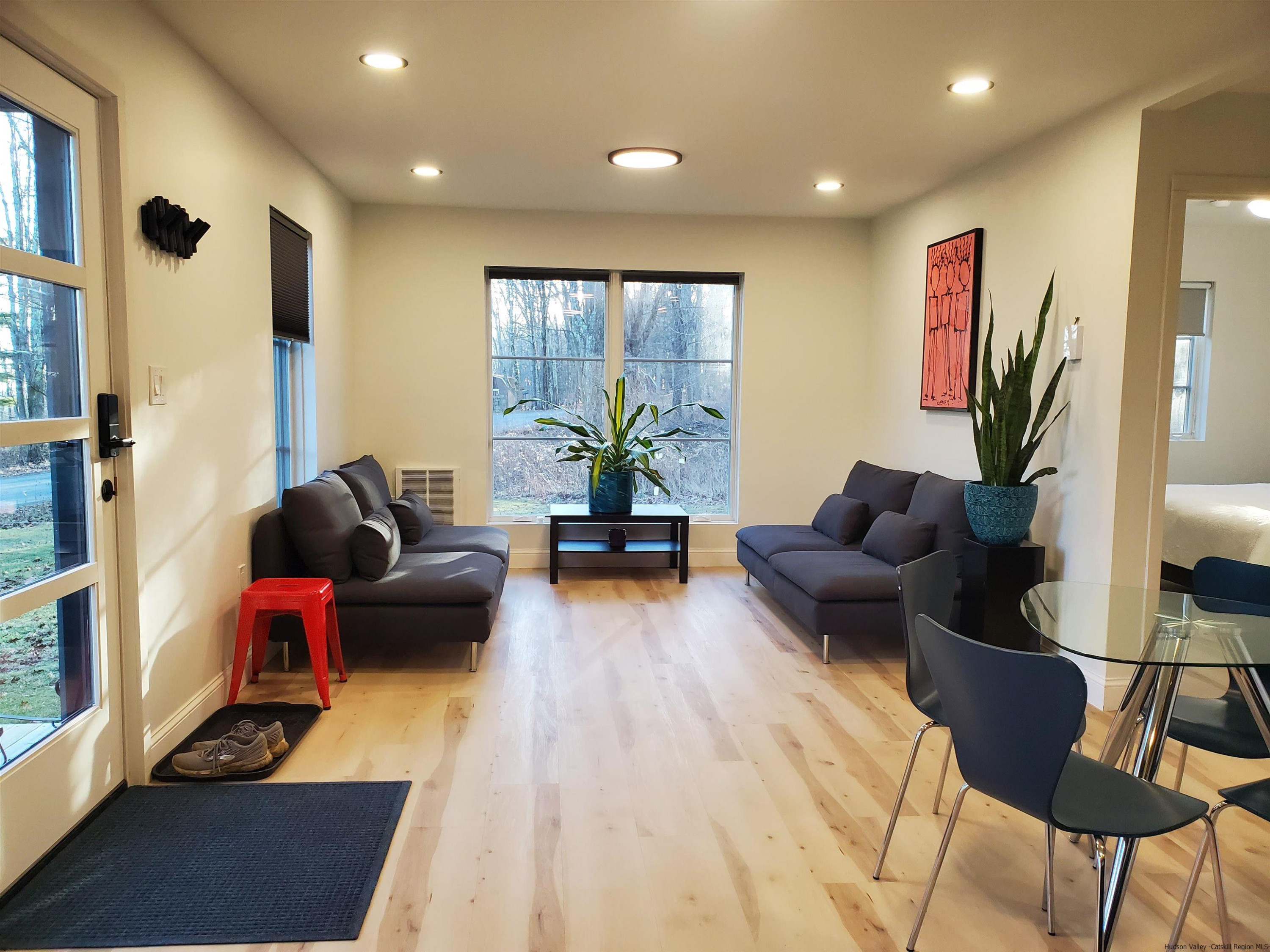 44 Dellenbaugh Road Cragsmoor, NY 12566 - Photo 5 of 12 a living room with furniture and a flat screen tv